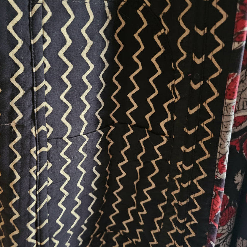 Black fabric with beige zigzag 
