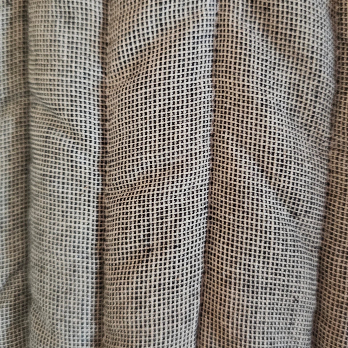Close-up of woven fabric with a grid pattern